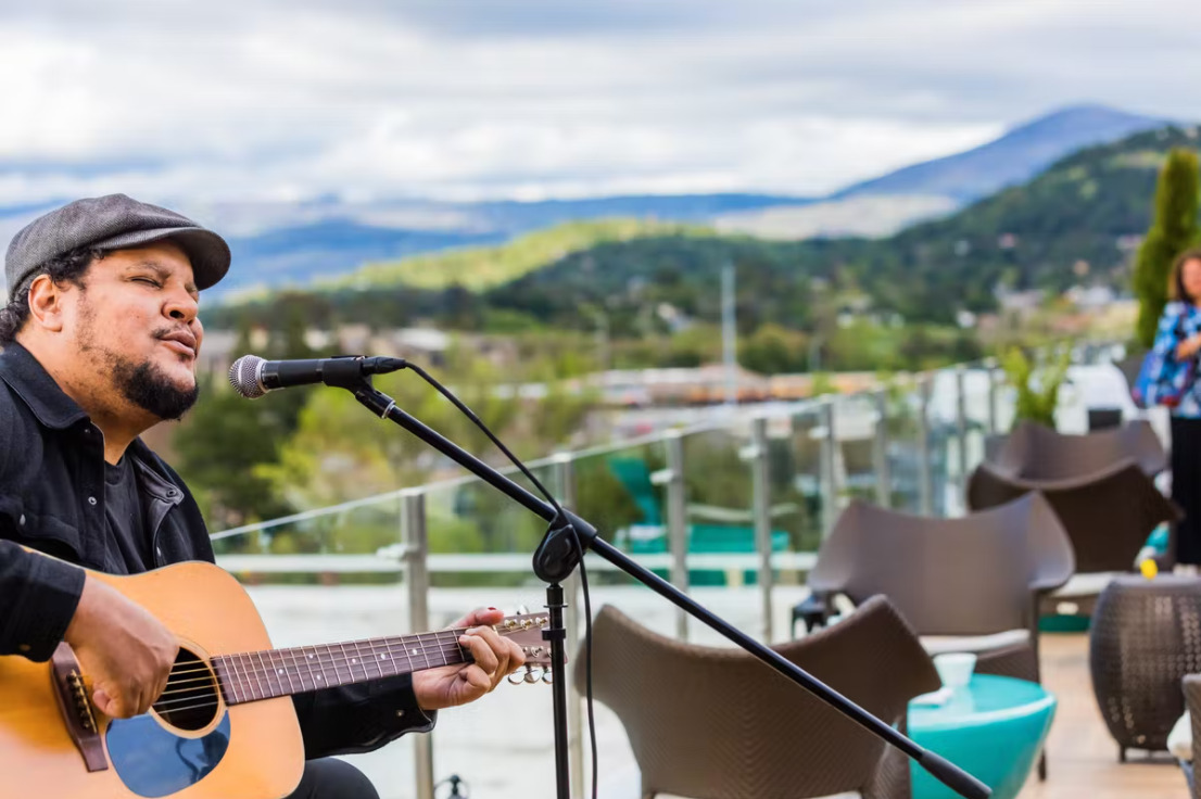 Musician plays at the Sky & Vine rooftop bar at Archer hotel in Napa