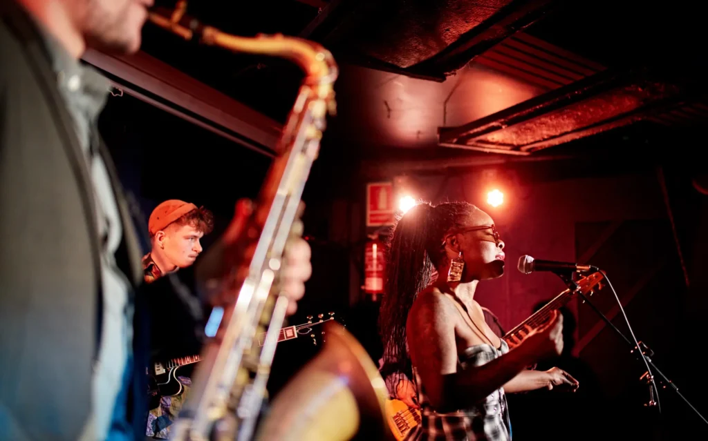 Live jazz performance in Napa featuring musicians playing onstage in an intimate music venue with warm lighting.